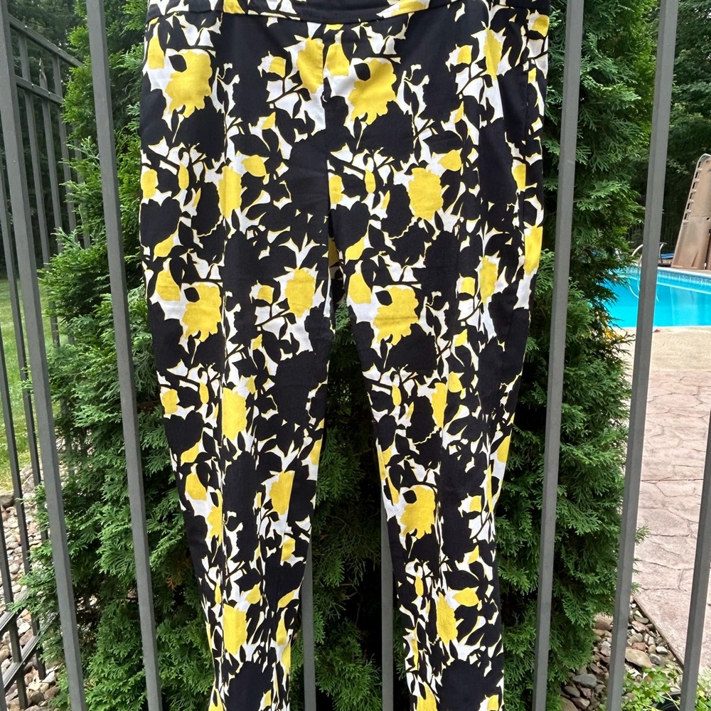 Black, white & yellow floral pants that are a bit stretchy.